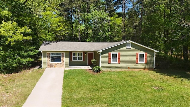 530 Bell Rd SE, Conyers, GA 30094 - view of front facade with concrete driveway and a front lawn