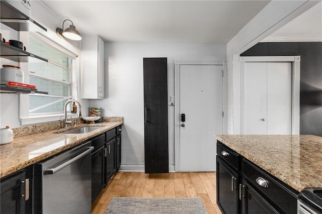 2240 Cheshire Bridge Rd NE Unit 206, Atlanta, GA 30324 - kitchen with stainless steel appliances, dark cabinets, open shelves, and light wood-type flooring
