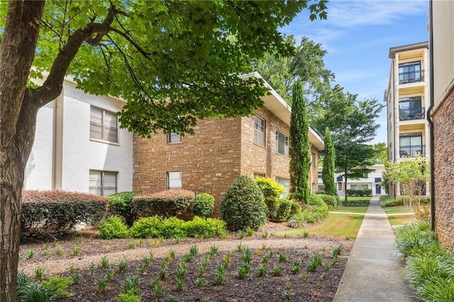 2240 Cheshire Bridge Rd NE Unit 206, Atlanta, GA 30324 - view of side of home featuring stone siding