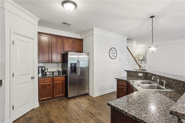 13468 Gardiner Ln, Alpharetta, GA 30004 - kitchen featuring stainless steel fridge with ice dispenser, a sink, dark wood-type flooring, ornamental molding, and hanging light fixtures