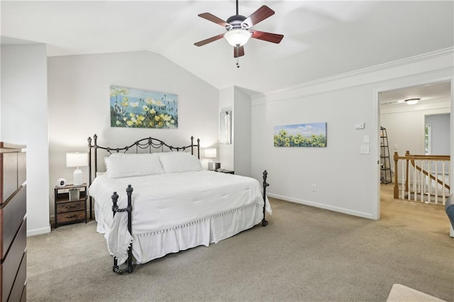 13468 Gardiner Ln, Alpharetta, GA 30004 - bedroom featuring carpet floors, vaulted ceiling, baseboards, and a ceiling fan