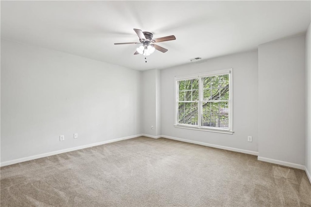 13468 Gardiner Ln, Alpharetta, GA 30004 - empty room with carpet floors, a ceiling fan, and baseboards