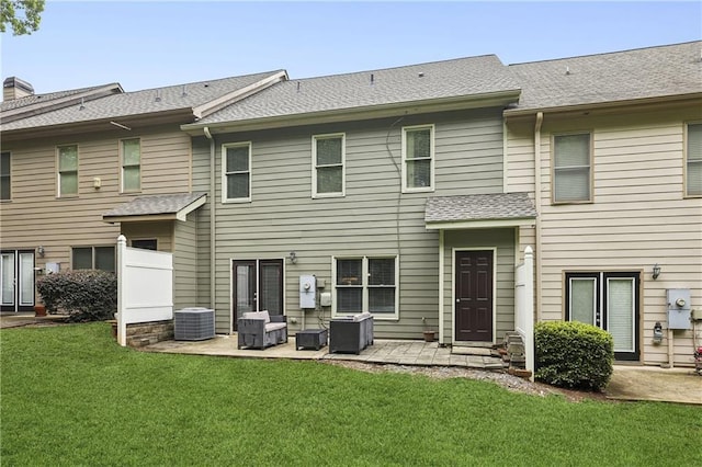 13468 Gardiner Ln, Alpharetta, GA 30004 - rear view of house featuring a patio area, central AC unit, a yard, and a shingled roof