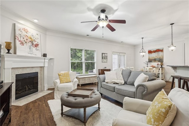 13468 Gardiner Ln, Alpharetta, GA 30004 - living room with dark wood-type flooring, a ceiling fan, ornamental molding, and a fireplace