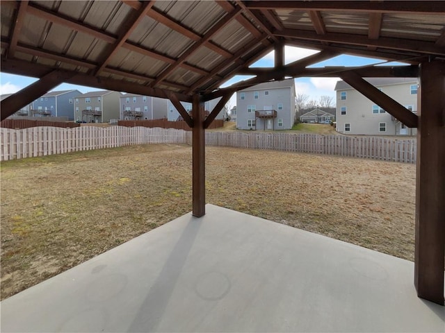 exterior space featuring a fenced backyard and a patio