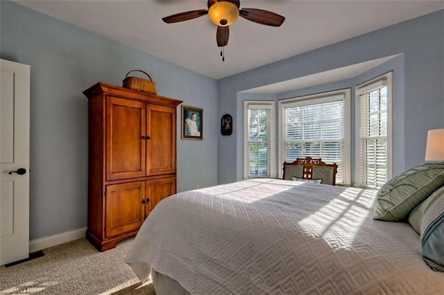 502 Cottage Crest Dr, Clarkesville, GA 30523 - bedroom featuring light colored carpet, baseboards, and a ceiling fan