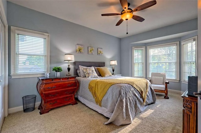 502 Cottage Crest Dr, Clarkesville, GA 30523 - bedroom with multiple windows, carpet flooring, baseboards, and ceiling fan
