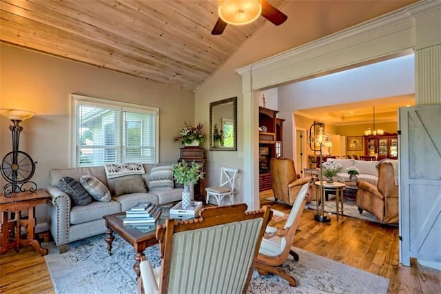 502 Cottage Crest Dr, Clarkesville, GA 30523 - living room featuring lofted ceiling, wood finished floors, a ceiling fan, a chandelier, and wooden ceiling