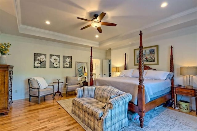 502 Cottage Crest Dr, Clarkesville, GA 30523 - bedroom with a raised ceiling, light wood-style flooring, recessed lighting, ornamental molding, and a ceiling fan