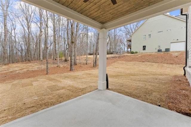 view of yard with a patio area and central air condition unit