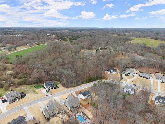 drone / aerial view with a forest view