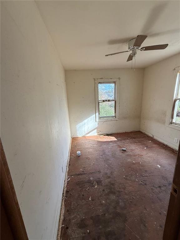 unfurnished room featuring ceiling fan