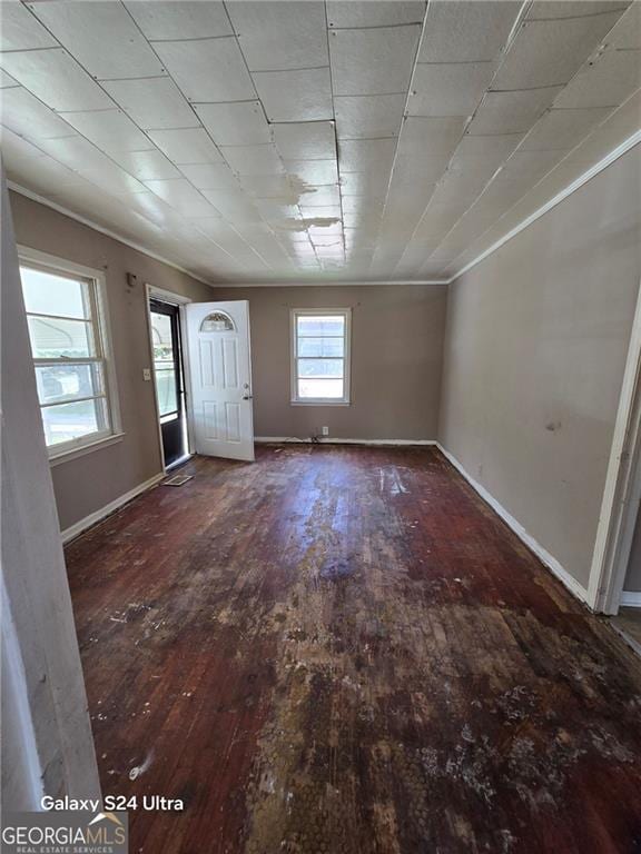1243 Hill St NW, Conyers, GA 30012 - foyer entrance featuring hardwood / wood-style flooring, baseboards, and ornamental molding