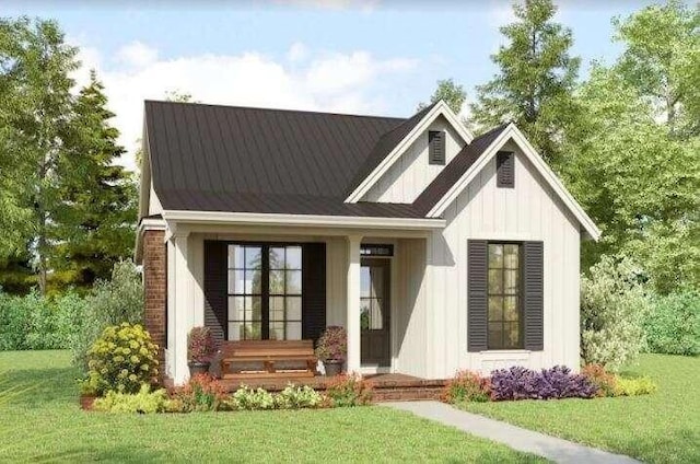 view of front facade with covered porch and a front yard