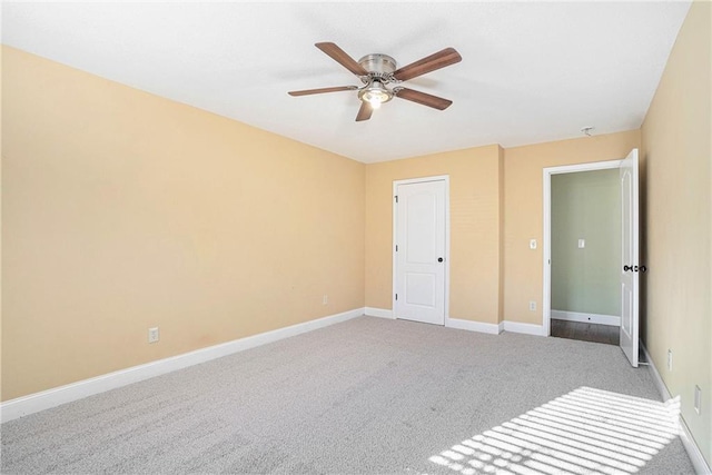 unfurnished bedroom with carpet flooring and ceiling fan