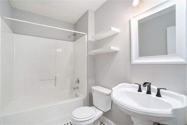 full bathroom featuring bathing tub / shower combination, sink, and toilet