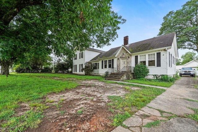 10 Shadburn Ferry Rd, Buford, GA 30518 - view of front of home with a chimney and a front lawn