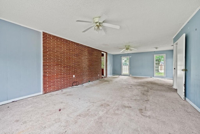 10 Shadburn Ferry Rd, Buford, GA 30518 - carpeted empty room featuring a ceiling fan, a textured ceiling, and brick wall