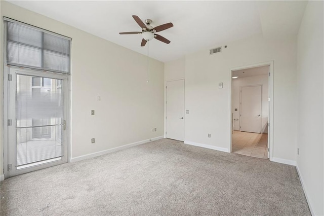 711 Cosmopolitan Dr NE Unit 802, Atlanta, GA 30324 - spare room featuring light colored carpet and ceiling fan