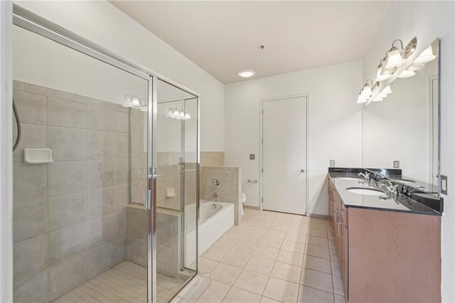 711 Cosmopolitan Dr NE Unit 802, Atlanta, GA 30324 - full bath featuring double vanity, a stall shower, tile patterned floors, and a garden tub