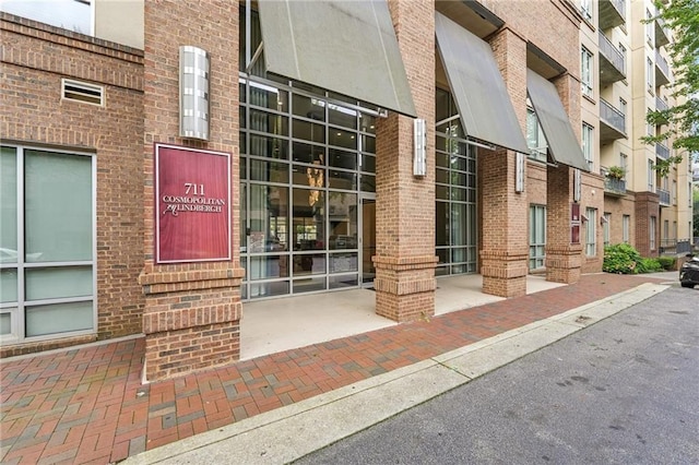 711 Cosmopolitan Dr NE Unit 802, Atlanta, GA 30324 - view of exterior entry featuring brick siding