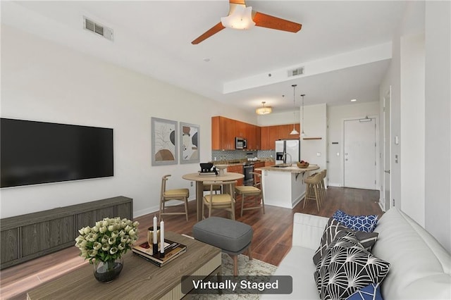 711 Cosmopolitan Dr NE Unit 802, Atlanta, GA 30324 - living area featuring dark wood-style floors and a ceiling fan