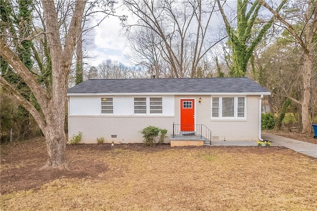 single story home featuring crawl space and brick siding