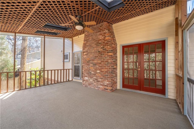 exterior space with ceiling fan and french doors