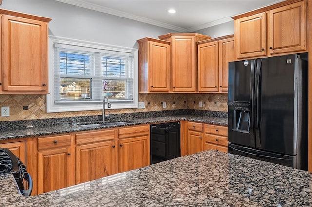 kitchen featuring crown molding, dark stone counters, sink, and black appliances