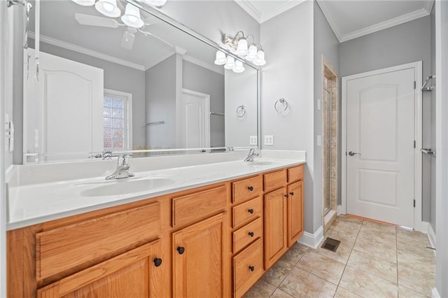 bathroom featuring vanity, ornamental molding, tile patterned floors, and walk in shower