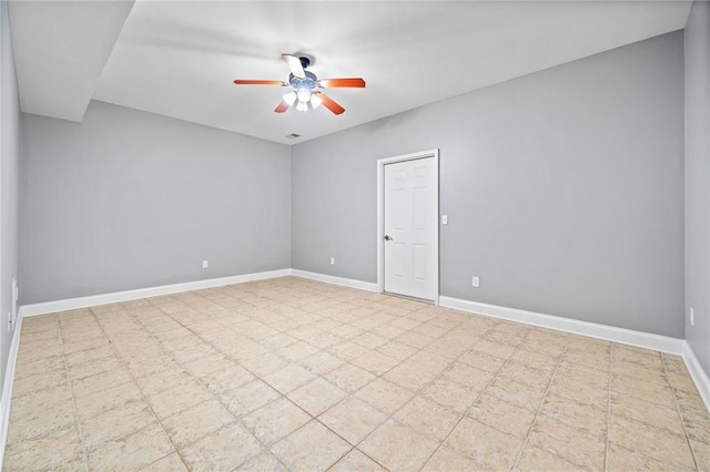 spare room with ceiling fan