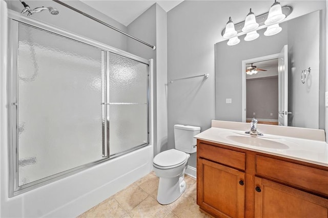 full bathroom with tile patterned flooring, enclosed tub / shower combo, vanity, and toilet