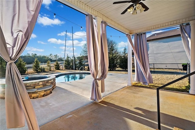 exterior space with an in ground hot tub, ceiling fan, and a patio area