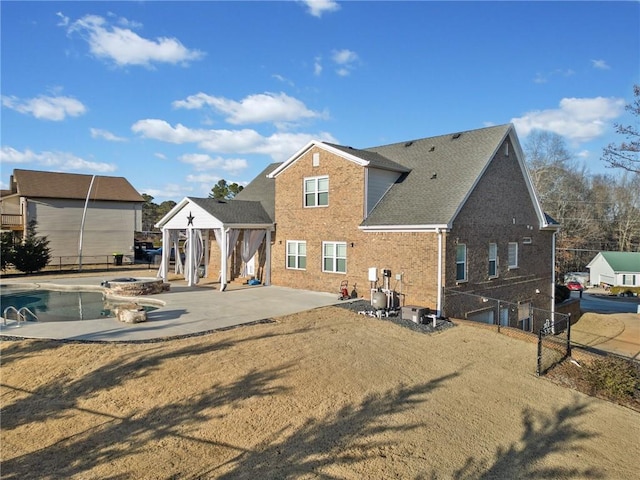 rear view of property with a patio