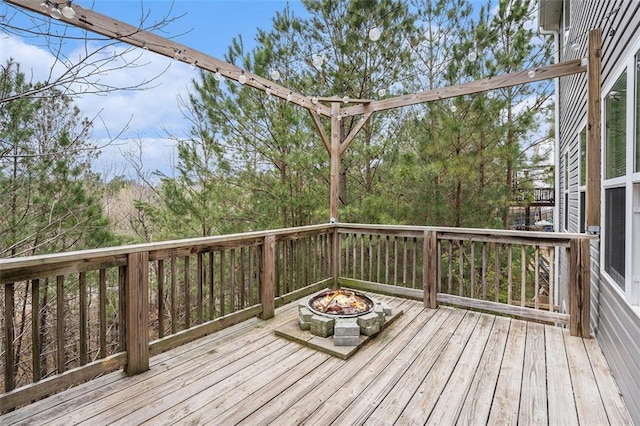 deck with an outdoor fire pit