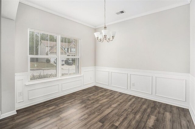 unfurnished dining area with ornamental molding, dark wood-type flooring, a chandelier, and visible vents