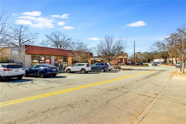 view of parking / parking lot