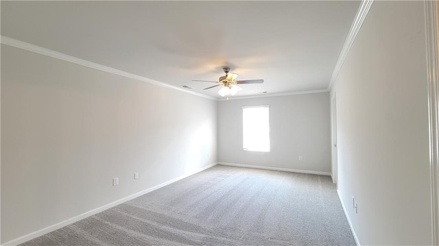 empty room featuring a ceiling fan, baseboards, light colored carpet, and crown molding