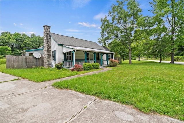 3517 Plunkett Rd, Stonecrest, GA 30038 - bungalow-style house featuring covered porch and a chimney