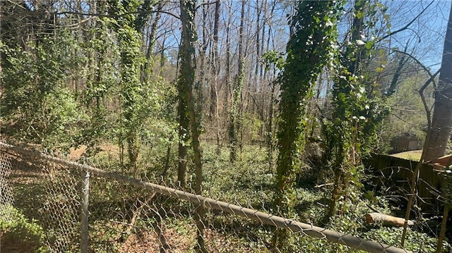 view of local wilderness featuring a forest view