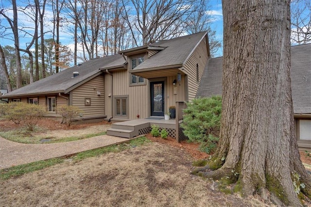 view of front of property with a shingled roof