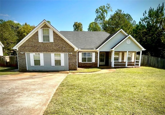 view of front facade with a front lawn and a porch