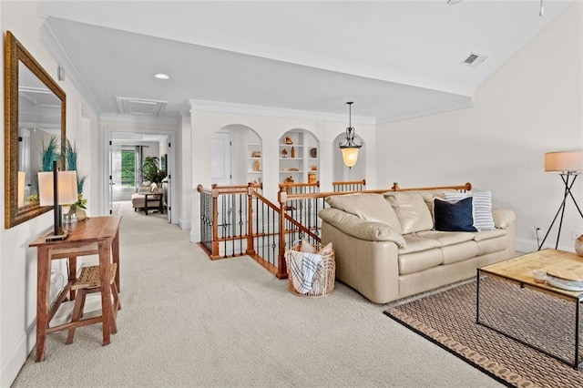 1771 Silvergrass Ln, Grayson, GA 30017 - living area featuring attic access, ornamental molding, and light colored carpet