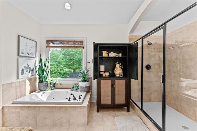 1771 Silvergrass Ln, Grayson, GA 30017 - full bath with a jetted tub, a shower stall, and tile patterned flooring