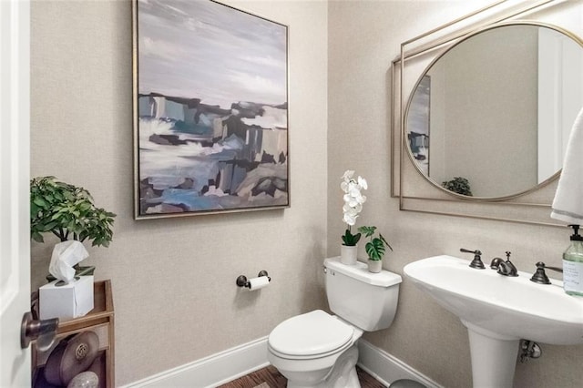 1771 Silvergrass Ln, Grayson, GA 30017 - bathroom featuring toilet and baseboards