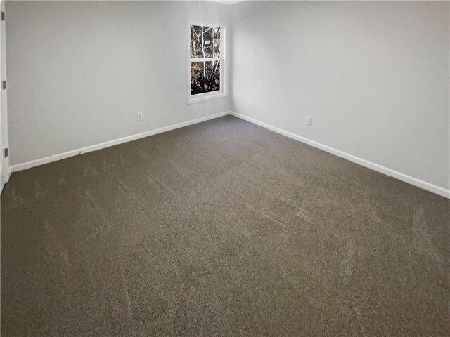 unfurnished living room with ceiling fan