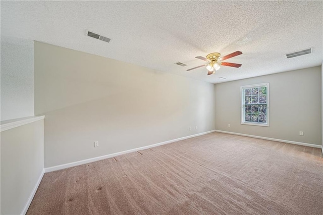237 Raventree Ln, Griffin, GA 30224 - unfurnished room with a ceiling fan, carpet, and a textured ceiling