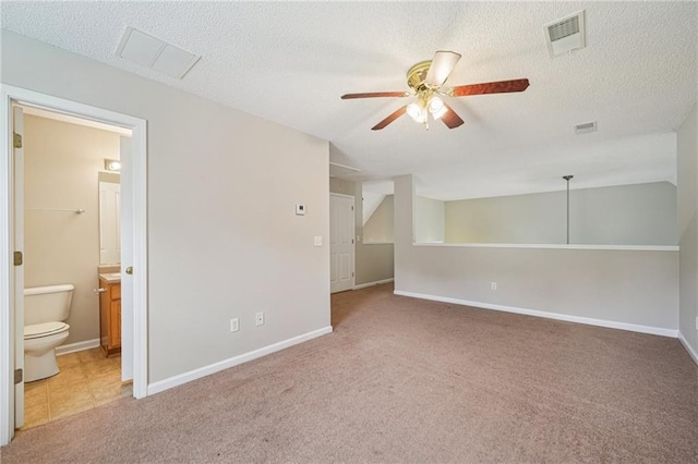 237 Raventree Ln, Griffin, GA 30224 - empty room featuring a ceiling fan, carpet flooring, and a textured ceiling