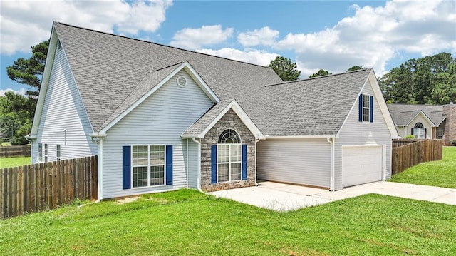 237 Raventree Ln, Griffin, GA 30224 - traditional-style home featuring concrete driveway, stone siding, roof with shingles, and an attached garage
