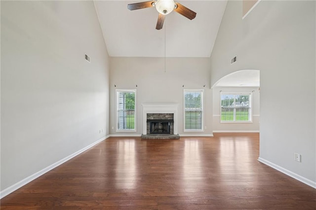 237 Raventree Ln, Griffin, GA 30224 - unfurnished living room with ceiling fan, plenty of natural light, wood finished floors, and high vaulted ceiling